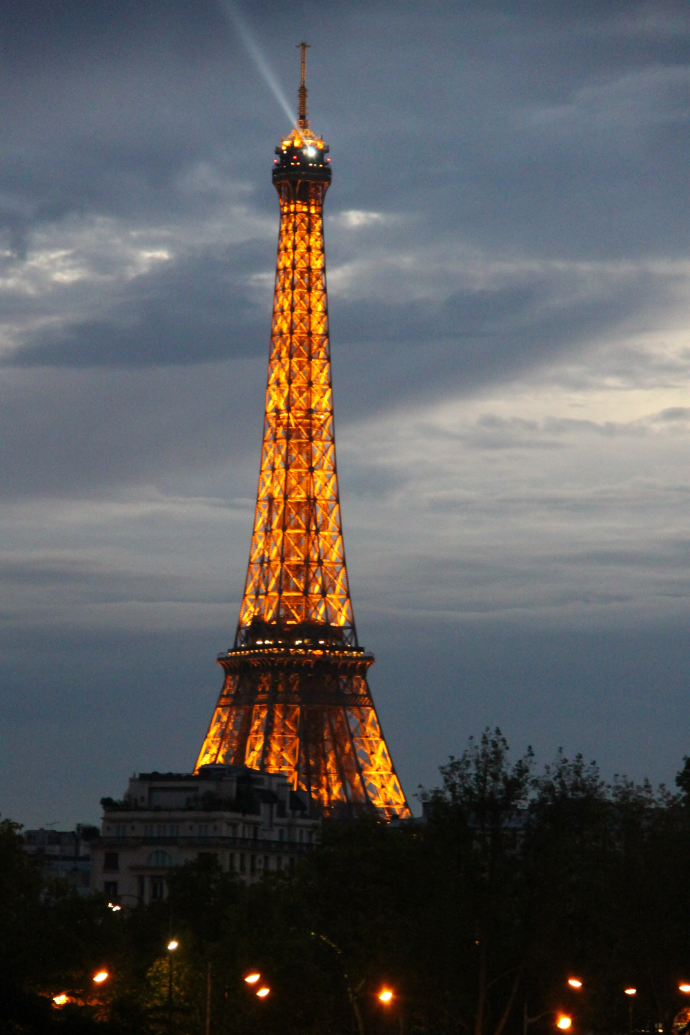 All about the Eiffel Tower by night in Paris