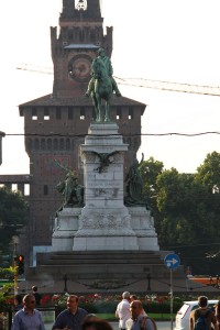 The Statue of Giuseppe Garibaldi and the Sforza Castle in Milan, Italy