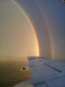 Spectacular rainbow seen from the airplane - rain