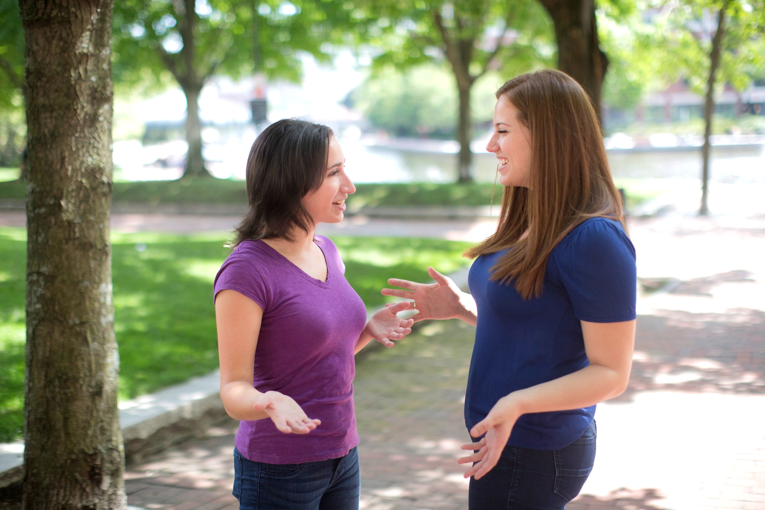 two women interacting - say how are you in 30 languages