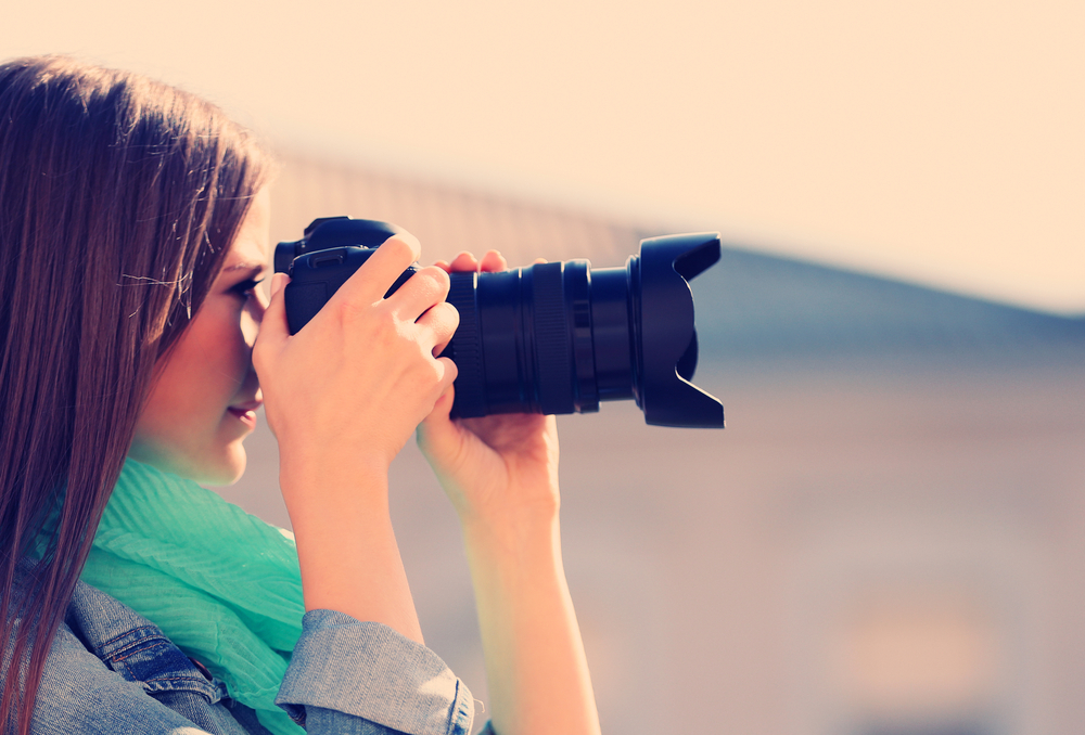 girl taking photos