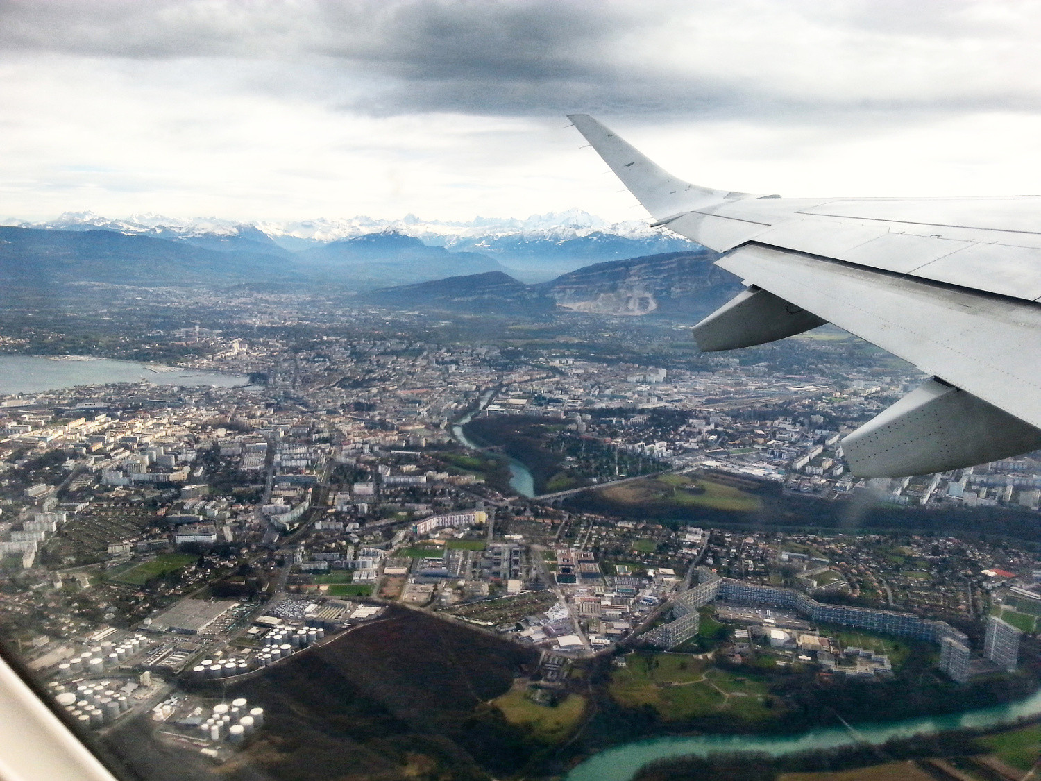 Swiss Alps seen from the airplane while landing on the Geneva Airport