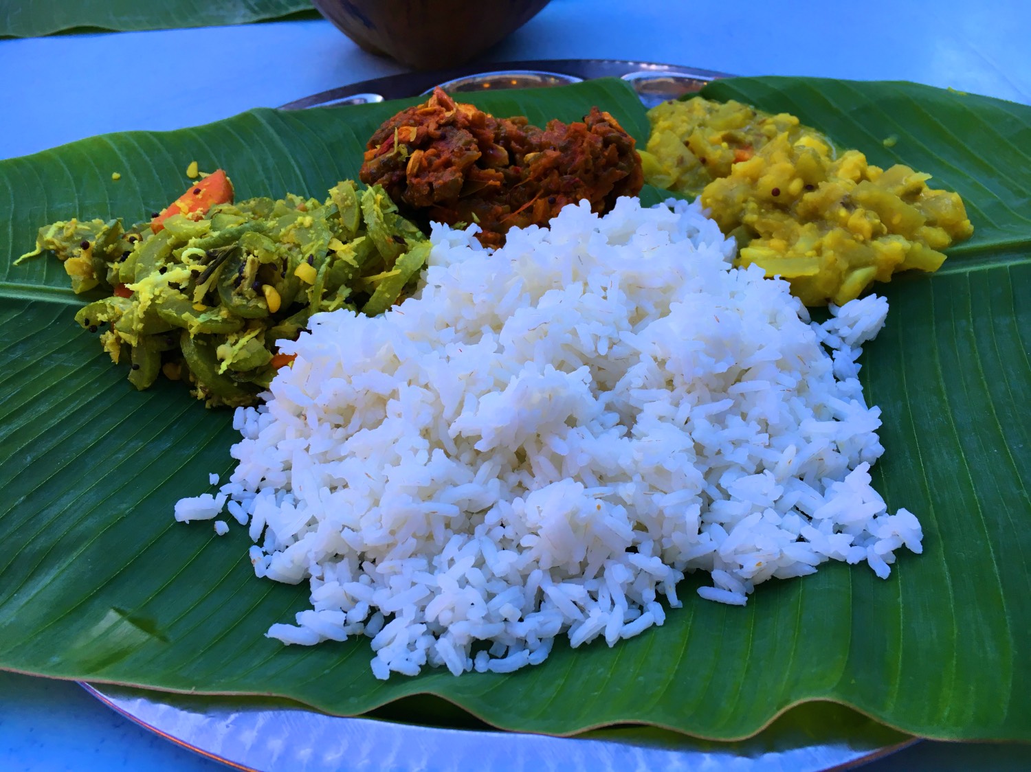Banana leaf curry. This is one of the best things to do in Kuala Lumpur, Malaysa in 2 days. Read the article for a complete 2-day itinerary for KL. #kl #malaysia. #klitinerary #2daykualalumpur #kualalumpurguide #kualalumpurtraveling #kualalumpuritinerary #klitinerary