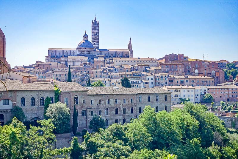 The historic centre of Siena, Italy is one of the best UNESCO heritage sites in Europe. Read the article to discover more natural sites in Europe, and a list of world heritage in Europe to add to your bucket list. #UNESCO #unescosites #unescositeseurope #europeunesco #italyunesco #italy