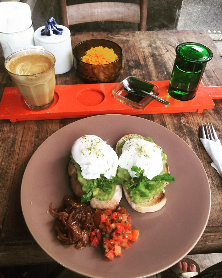 Seniman Coffee Studio is a great place to eat breakfast in Ubud. They also have a coffee workshop. Read this itinerary for Ubud and see the best things to do in Ubud. #ubuditinerary #ubudguide #baliindonesia #balitravel #bali #baliholiday #balinese #ubud