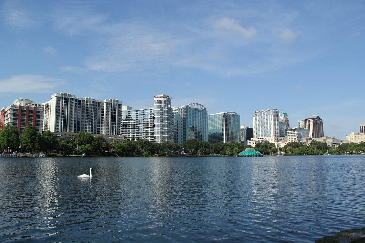Riding swan boats at Lake Eola Park is one of the fun things to do in Orlando beyond the amusement parks